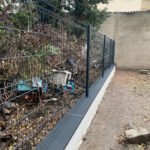 Réalisation d’un muret avec clôture pour séparation de deux propriétés